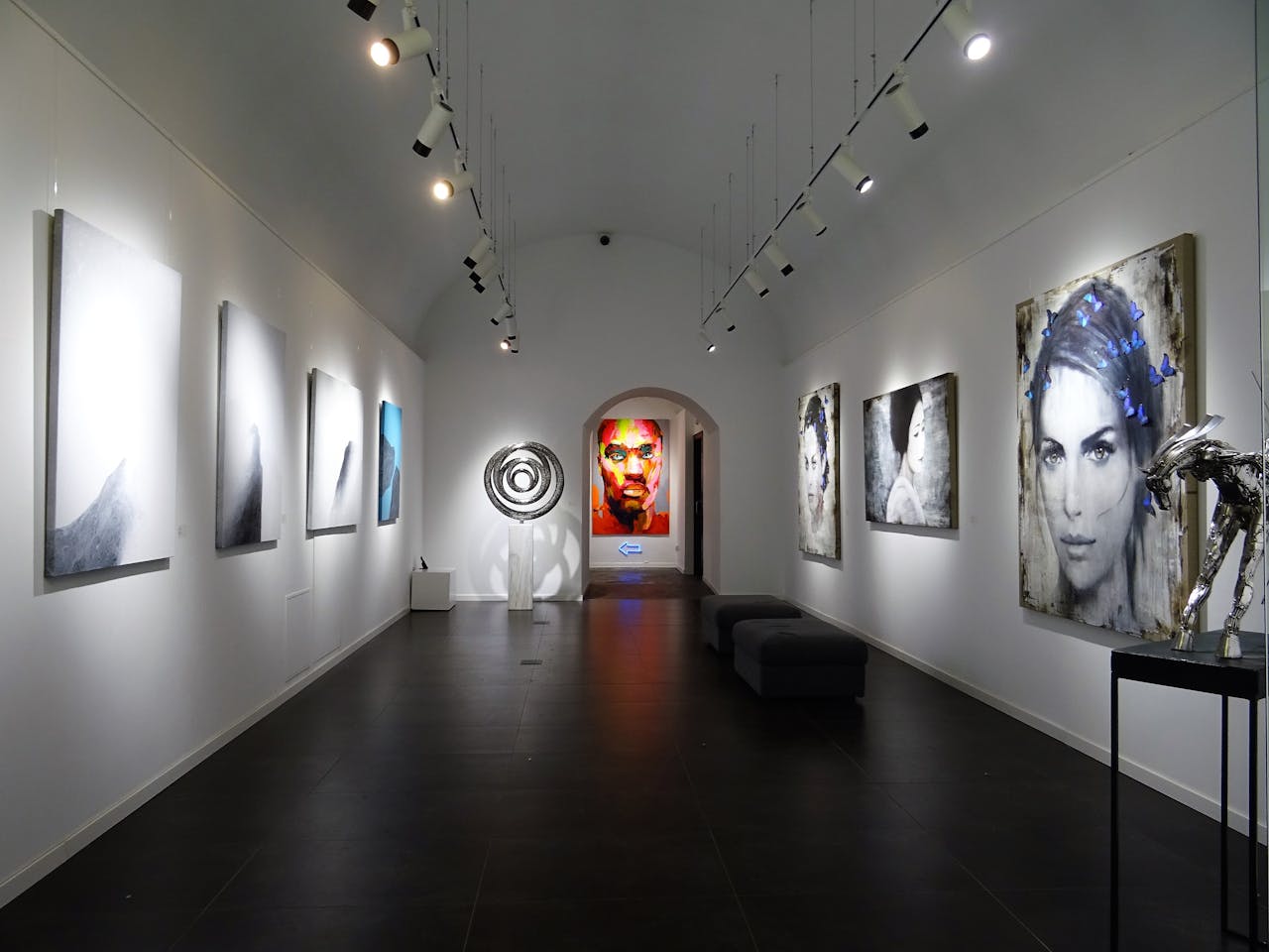 Crafting Captivating Headlines: Your awesome post title goes here Sleek and modern art gallery with various contemporary paintings on display.